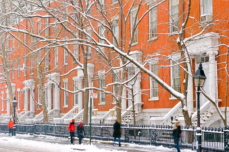 Winter snow and red townhouses, Greenwich Village, New York