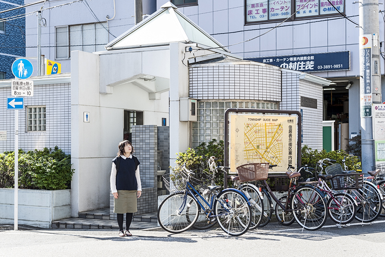 Woman lost in thought, Tokyo