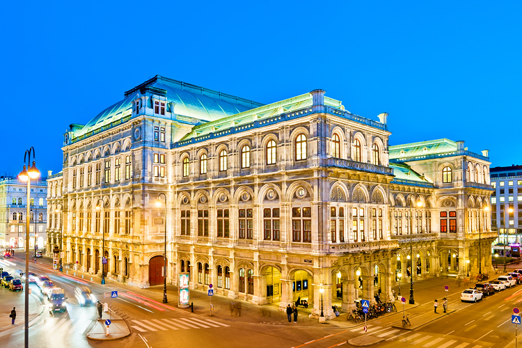 Vienna Opera House illuminated at dusk